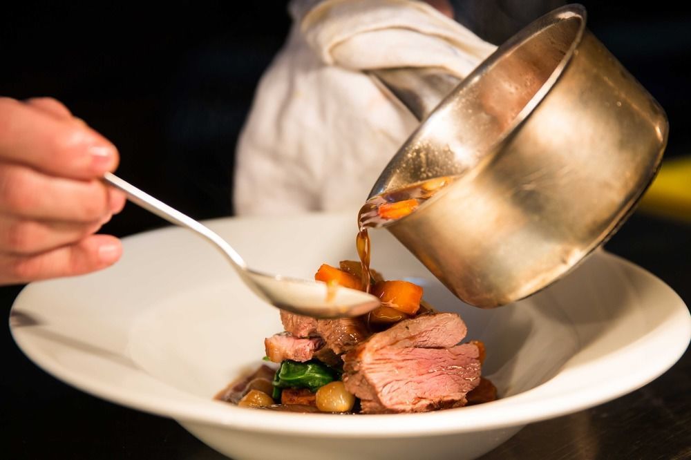 The Millstone, Mellor Hotel Blackburn  Exterior foto A chef plating a dish